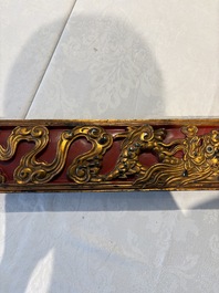 Six Chinese gilt-lacquered carved wooden panels with narrative design, 19th C.