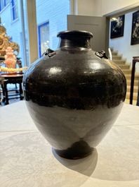 A Chinese black-glazed jar and a brown-glazed jar, Ming/Qing
