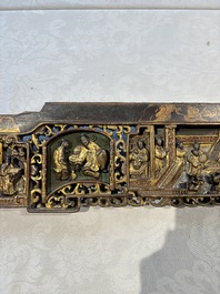 Six Chinese gilt-lacquered carved wooden panels with narrative design, 19th C.