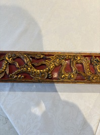 Six Chinese gilt-lacquered carved wooden panels with narrative design, 19th C.