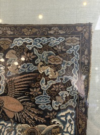 A Chinese silk kesi 'silver pheasant' or 'fifth rank' rank badge, Qing
