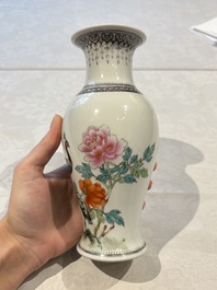 31 Chinese famille rose vases, Qianlong and Jingdezhen marks, 20th C.