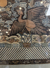 A Chinese silk kesi 'silver pheasant' or 'fifth rank' rank badge, Qing