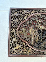 Six Chinese gilt-lacquered carved wooden panels with narrative design, 19th C.
