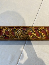 Six Chinese gilt-lacquered carved wooden panels with narrative design, 19th C.