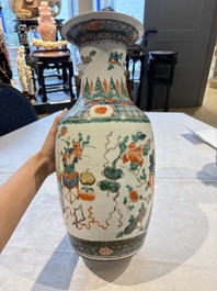 Four Chinese famille verte vases, a jar and a bowl, 19th C.