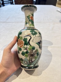 Four Chinese famille verte vases, a jar and a bowl, 19th C.