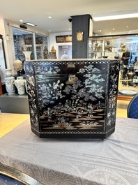 A large Chinese export mother-of-pearl-inlaid lacquer tea chest, 19th C.