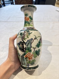 Four Chinese famille verte vases, a jar and a bowl, 19th C.