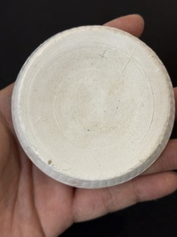 Nine Chinese white-glazed boxes and covers with incised floral design from the Jepara shipwreck, Dehua or Anxi kiln, Song