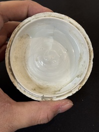 Nine Chinese white-glazed boxes and covers with incised floral design from the Jepara shipwreck, Dehua or Anxi kiln, Song