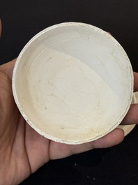 Nine Chinese white-glazed boxes and covers with incised floral design from the Jepara shipwreck, Dehua or Anxi kiln, Song