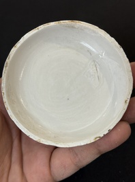 Nine Chinese white-glazed boxes and covers with incised floral design from the Jepara shipwreck, Dehua or Anxi kiln, Song