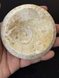 Nine Chinese white-glazed boxes and covers with incised floral design from the Jepara shipwreck, Dehua or Anxi kiln, Song