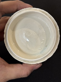 Nine Chinese white-glazed boxes and covers with incised floral design from the Jepara shipwreck, Dehua or Anxi kiln, Song