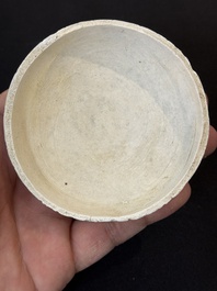 Nine Chinese white-glazed boxes and covers with incised floral design from the Jepara shipwreck, Dehua or Anxi kiln, Song