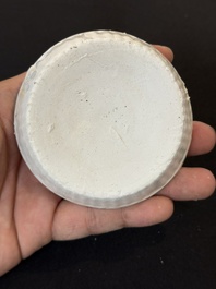 Nine Chinese white-glazed boxes and covers with incised floral design from the Jepara shipwreck, Dehua or Anxi kiln, Song