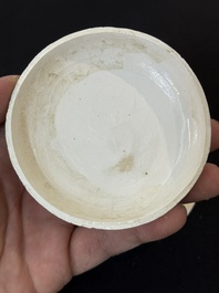 Nine Chinese white-glazed boxes and covers with incised floral design from the Jepara shipwreck, Dehua or Anxi kiln, Song