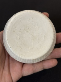 Nine Chinese white-glazed boxes and covers with incised floral design from the Jepara shipwreck, Dehua or Anxi kiln, Song