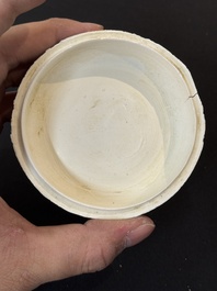 Nine Chinese white-glazed boxes and covers with incised floral design from the Jepara shipwreck, Dehua or Anxi kiln, Song