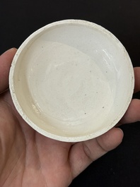 Nine Chinese white-glazed boxes and covers with incised floral design from the Jepara shipwreck, Dehua or Anxi kiln, Song