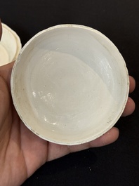 Nine Chinese white-glazed boxes and covers with incised floral design from the Jepara shipwreck, Dehua or Anxi kiln, Song