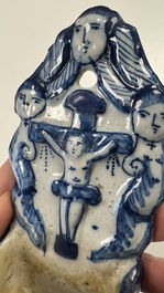 Two blue and white Dutch Delft holy water fonts, 17th C.