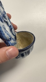 Two blue and white Dutch Delft holy water fonts, 17th C.