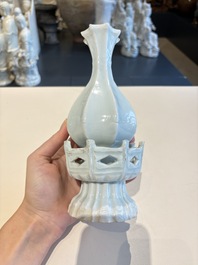 A pair of Chinese qingbai vases and a cup on a stand, 20th C.