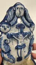Two blue and white Dutch Delft holy water fonts, 17th C.