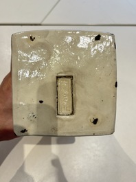 A Chinese cream-glazed pillow, a grey terracotta roof tile and a grey-glazed cover, Republic and earlier