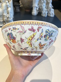 A Chinese grisaille coral red-ground vase, a famille rose eggshell vase and two bowls, Qianlong mark, 20th C.