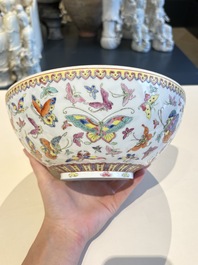 A Chinese grisaille coral red-ground vase, a famille rose eggshell vase and two bowls, Qianlong mark, 20th C.