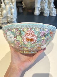 A Chinese grisaille coral red-ground vase, a famille rose eggshell vase and two bowls, Qianlong mark, 20th C.