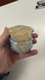 Two blue and white Dutch Delft holy water fonts, 17th C.