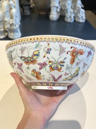 A Chinese grisaille coral red-ground vase, a famille rose eggshell vase and two bowls, Qianlong mark, 20th C.