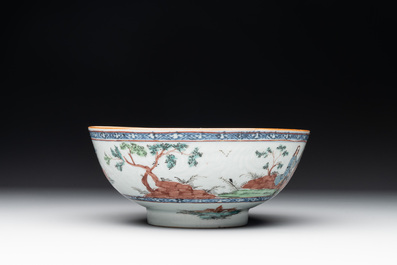 Two Dutch-decorated Chinese blue and white bowls with figures and landscapes, Qianlong