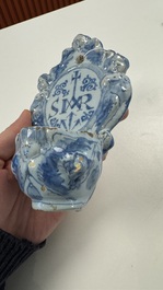 Two blue and white Dutch Delft holy water fonts, 17th C.