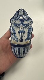 Two blue and white Dutch Delft holy water fonts, 17th C.