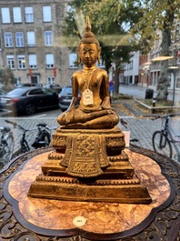A large Thai gilt-lacquered bronze Buddha, 19th C.
