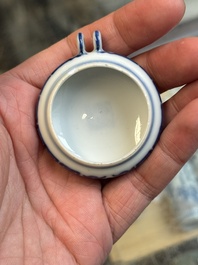 A fine Chinese archaistic blue and white bird feeder with chilong design, Qianlong mark and of the period