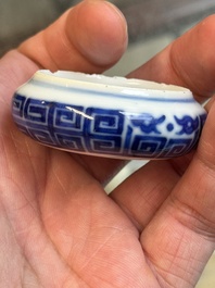 A fine Chinese archaistic blue and white bird feeder with chilong design, Qianlong mark and of the period