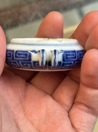 A fine Chinese archaistic blue and white bird feeder with chilong design, Qianlong mark and of the period