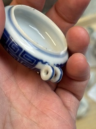 A fine Chinese archaistic blue and white bird feeder with chilong design, Qianlong mark and of the period