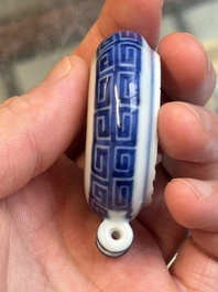 A fine Chinese archaistic blue and white bird feeder with chilong design, Qianlong mark and of the period