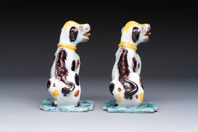 A pair of polychrome Dutch Delft models of dogs, 18th C.