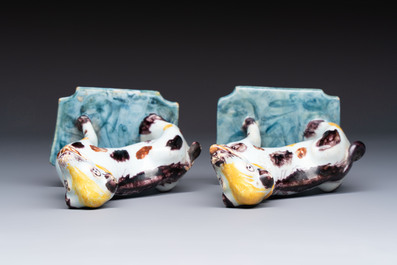 A pair of polychrome Dutch Delft models of dogs, 18th C.