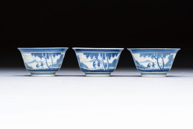Three Japanese Arita blue and white &lsquo;Van Frytom&rsquo; cups and four shield-shaped saucers, Ming and Chenghua mark, ca. 1700