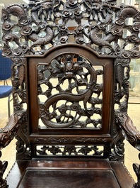 A richly carved Chinese hongmu 'dragon' armchair, Canton, 19th C.