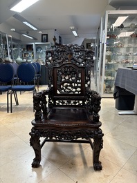 A richly carved Chinese hongmu 'dragon' armchair, Canton, 19th C.